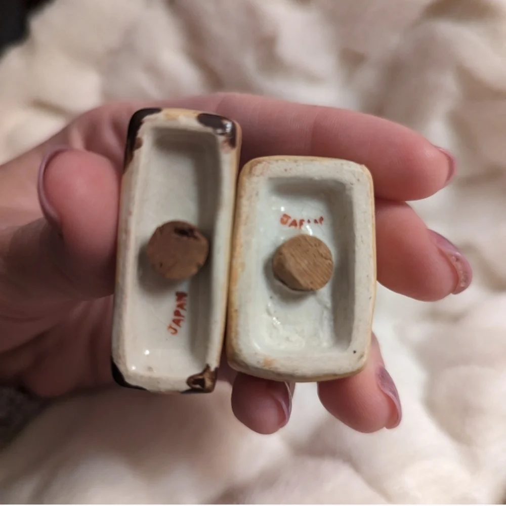 Vintage salt and pepper woman w luggage